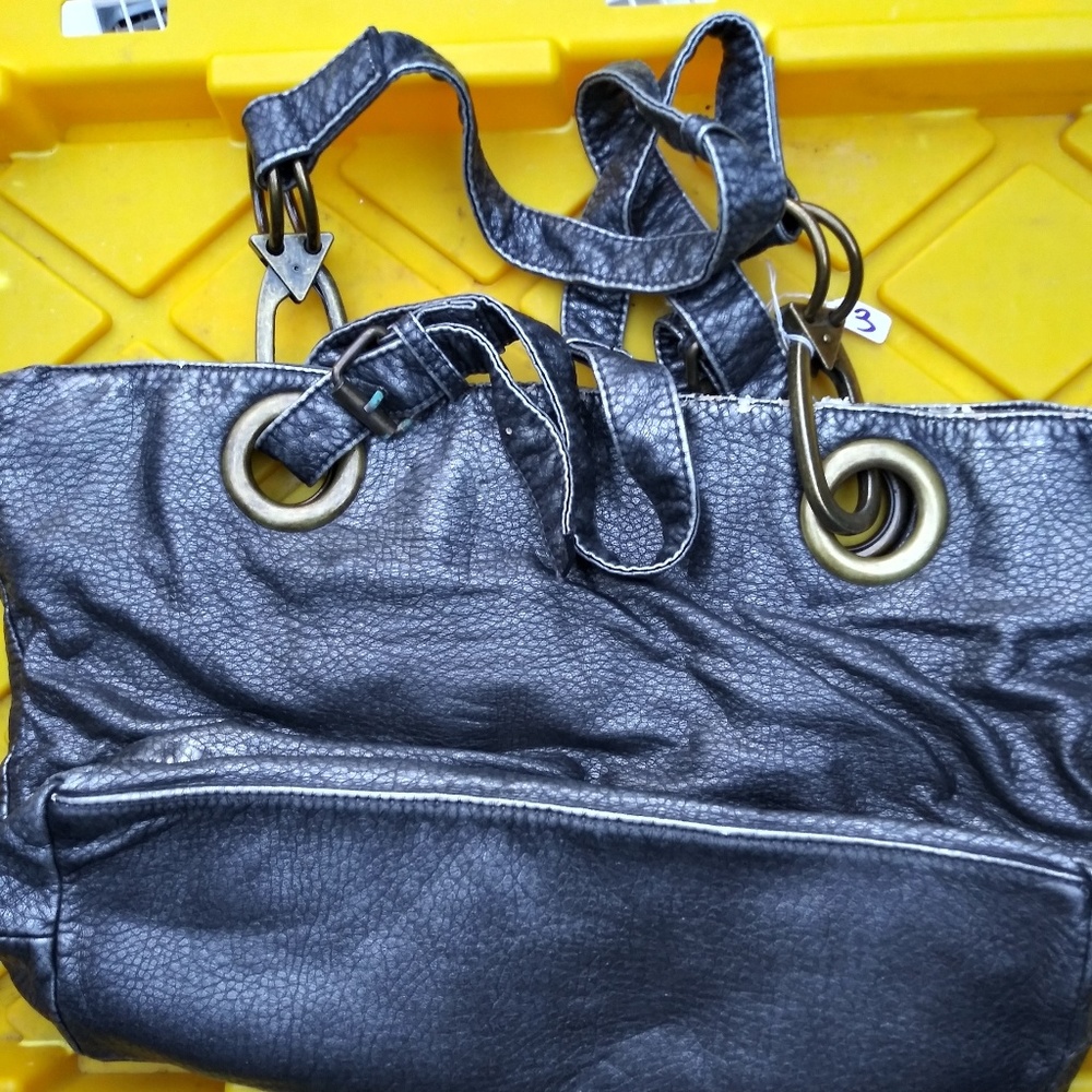 Three shoulder purses and a wallet